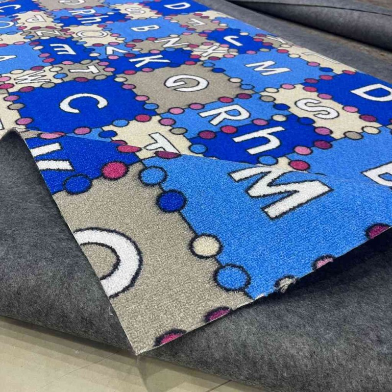 Children's carpet with sky blue letters